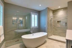 Luxury bathroom renovation with freestanding tub and walk-in shower