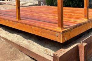 Newly constructed wooden deck with built-in seating