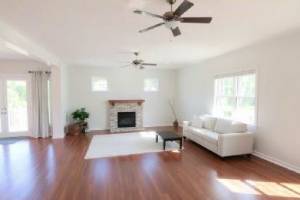 Living room makeover with new flooring and fresh paint