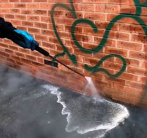 Graffiti removal in progress