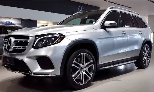 Silver 2018 Mercedes-Benz GLE 350 SUV parked in a showroom